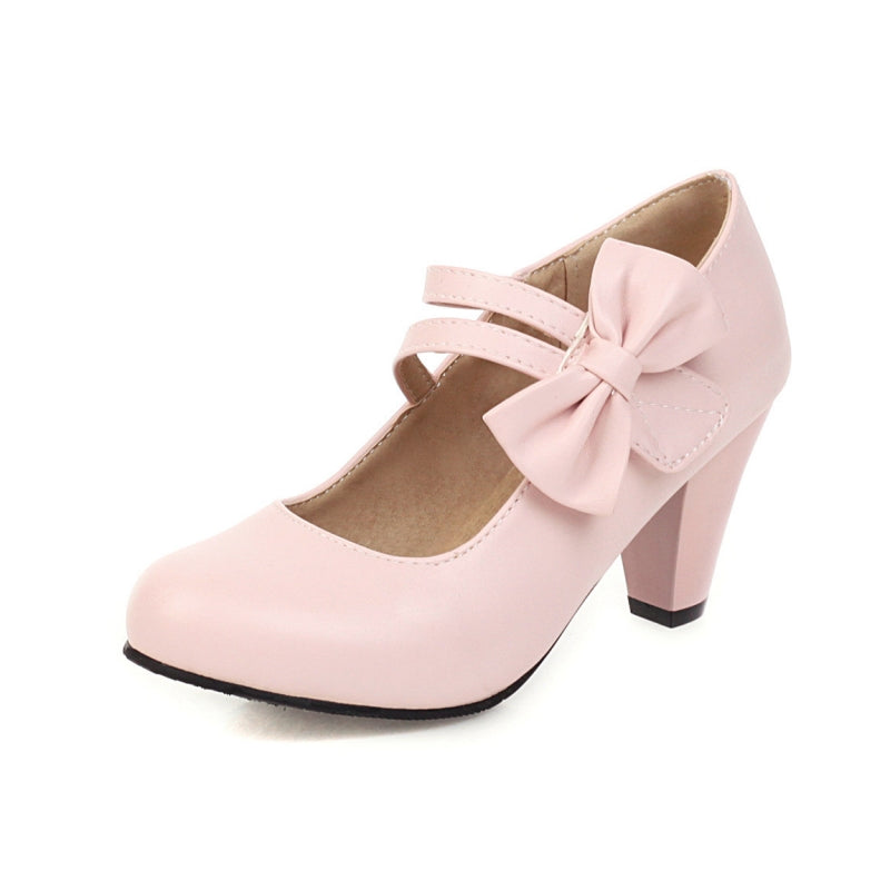 Tacones altos con punta redonda y lazo