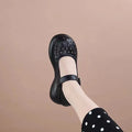 Crocs de punta redonda de cuero genuino