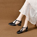 Zapatos de piel con punta redonda y tacón grueso
