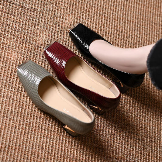 Zapatos de vestir con punta de metal y acabado piel de serpiente